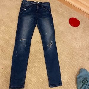 Blue jeans with a rips